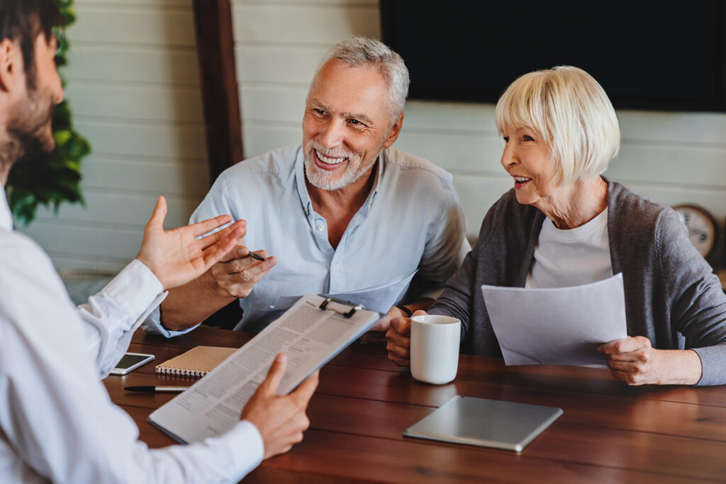 Types of 1031 Exchanges 1 A couple discussing the benefits of 1031 exchange types with their qualified intermediary.